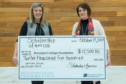 Brazosport College recently received a grant from Scholarship America to be used for Hurricane Harvey disaster relief. The $12,500 grant, which was disbursed through the Brazosport College Foundation, went to eligible students whose educational goals were adversely impacted by Hurricane Harvey or Tropical Storm Harvey. A total of 50 Brazosport College students benefitted from the grant. Pictured are, from left, Tracee Watts, Brazosport College Foundation Development Officer and Serena Andrews, Brazosport College Vice President of College Advancement. To learn more about scholarships through Brazosport College and the BC Foundation, call (979) 230-3245. BrazoSport College最近收到了奖学金的授予,以便用于哈维灾难救济。12,500美元的赠款,通过BrazoSport Countainfirult支付,